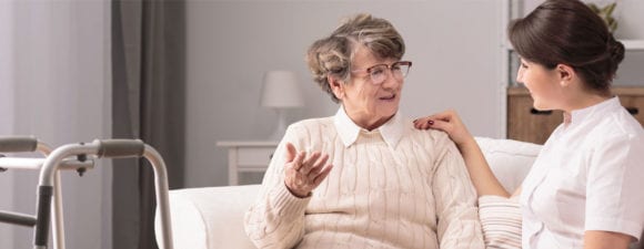 caregiver talking with senior