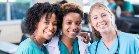 group of nurses smiling