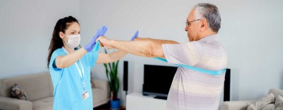 OT working with elderly man in the home