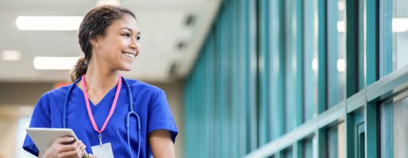 new nurse holds tablet