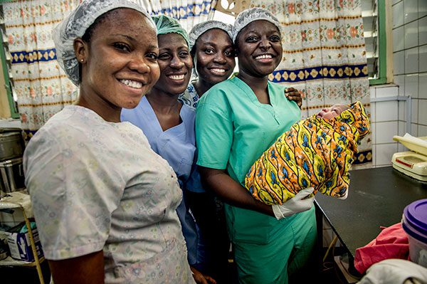 Maternal care providers with newborn in Madagascar (Jhpiego)