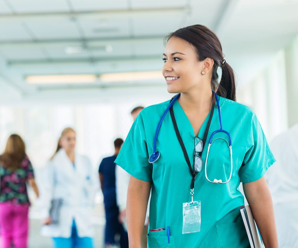 https://www.relias.com/wp-content/uploads/2022/10/nurse-walking-in-hospital-hallway.jpg