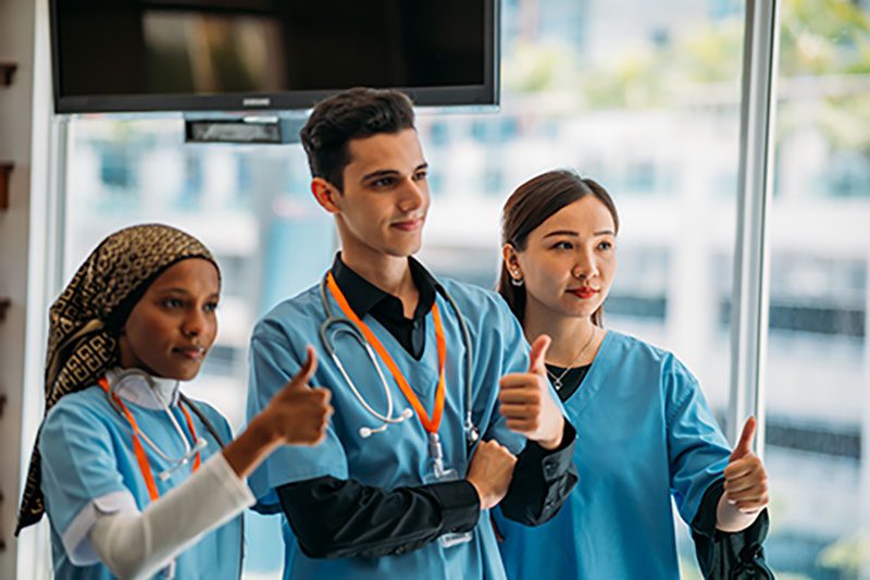 A healthcare team celebrating