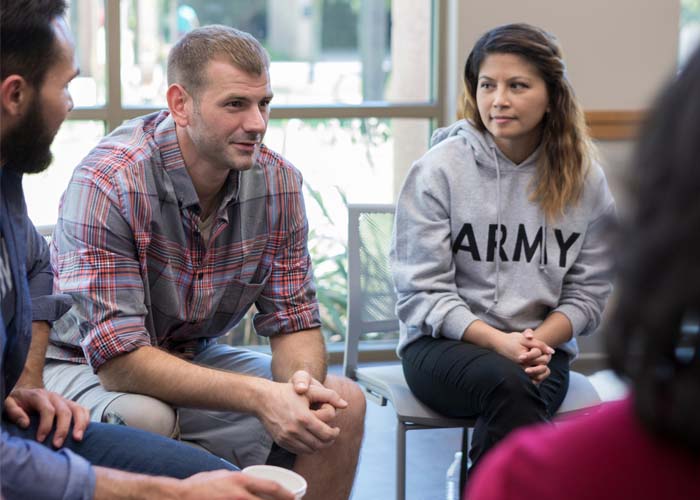 A group of veterans participating in a veterans suicide prevention program