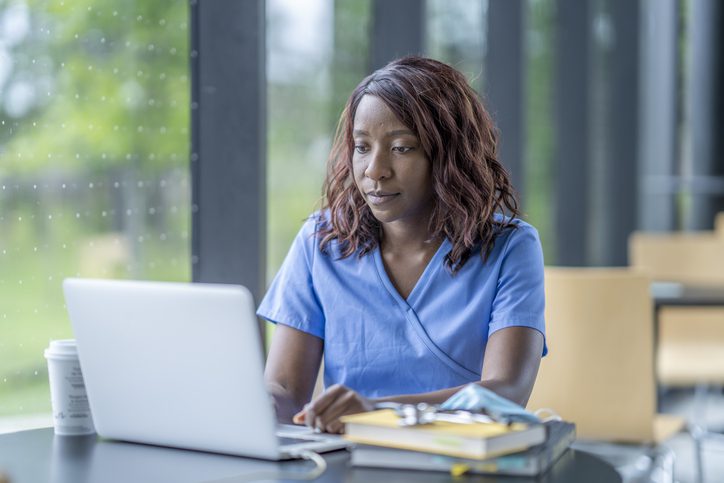 Nurse working on a laptop