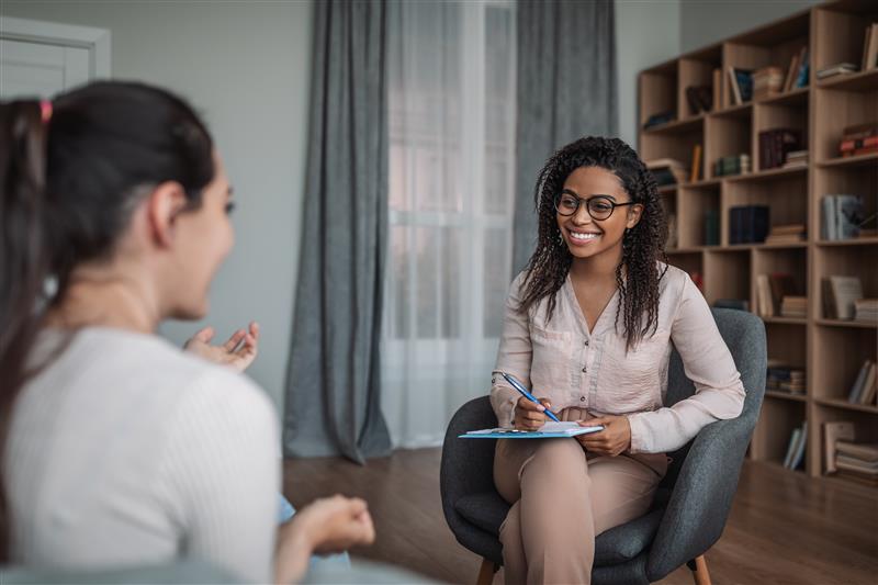Therapist meeting a client in her office
